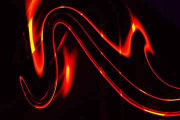 Mesmerizing abstract crimson and golden light trails gracefully swirl, creating a vibrant, energetic luminous pattern against a deep dark background, evoking fluid warmth