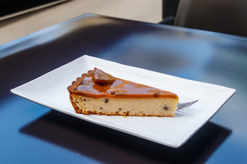Piece of chestnut cheesecake on a table