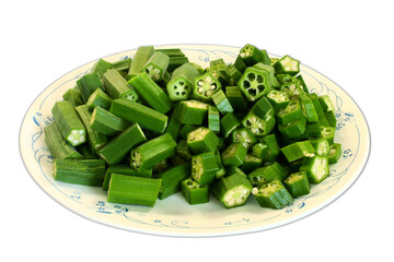 fresh cut green Lady Fingers or Okra vegetable in plate, cutout in transparent background, png format