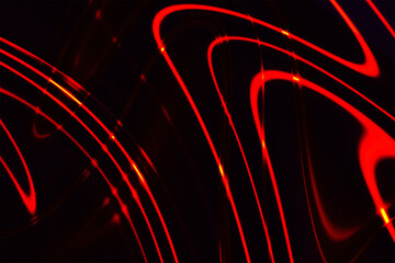 Dynamic motion captured in glowing red light streams, creating an abstract and futuristic pattern for a modern technology concept