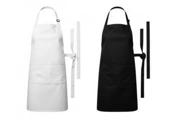 Two full length aprons one white and one black isolated on transparent background
