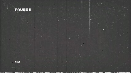 Videocassette recorder (VCR) Pause, VHS effects, artifacts and noise. Glitches of old damaged tape cassettes 4k - Powered by Adobe