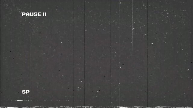 Videocassette recorder (VCR) Pause, VHS effects, artifacts and noise. Glitches of old damaged tape cassettes 4k