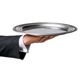 A hand in a dark suit holds a round, empty silver platter