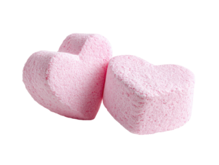 Two pink heart-shaped bath bombs