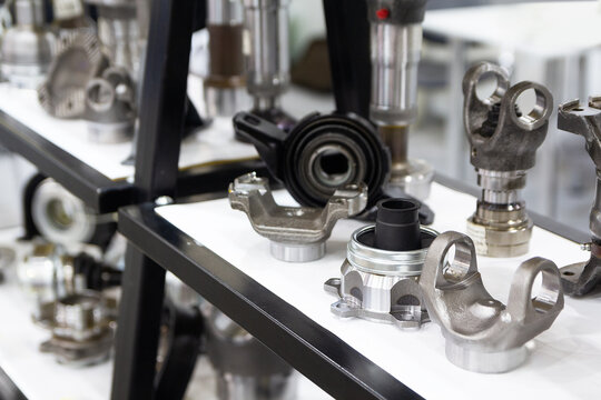 Transmission elements and other car parts on display in a store