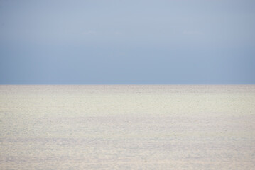 Minimal Seascape with Calm Waters and Soft Blue Sky in Northern Zealand, Denmark