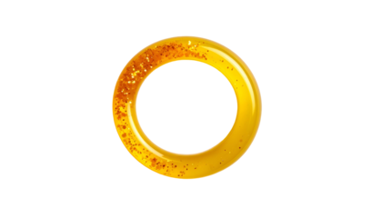 Golden ring with glitter texture, glowing against a black background