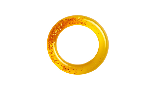Golden ring with glitter texture, glowing against a black background