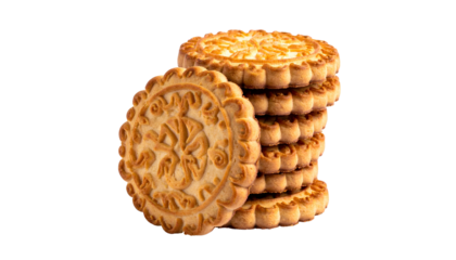 Stacked golden cookies with intricate designs, one leaning against the pile, on a black background