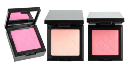 Three compacts displaying various shades of blush with etched patterns in square cases
