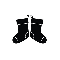 Two black christmas stockings with white trim vector