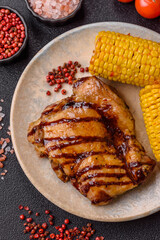 Grilled boneless chicken legs baked on the barbecue for lunch. Grilled chicken as a background
