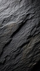 A striking black slate background provides a dramatic foundation, showcasing intricate textures in sharp focus. Ideal for conveying sophistication and depth in various creative projects.