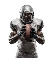 An American football player in full gear confidently holds the ball, gazing directly at the camera. The clean white background highlights their athleticism and determination.