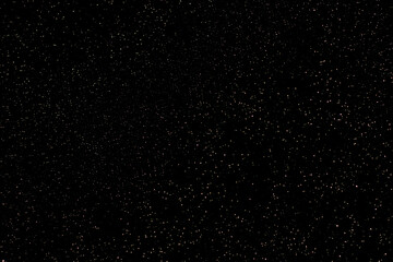 Starry night sky full of tiny stars across a vast, quiet celestial expanse