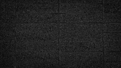 Abstract background with black wall texture for web banner template or wallpaper design.