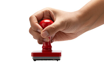 Hand holding red rubber stamp for approval or official document