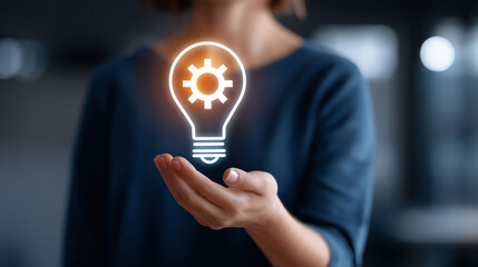 Innovative concept of a light bulb icon in a woman's hand modern workplace digital art inspirational environment