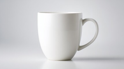 Empty white coffee mug, studio shot