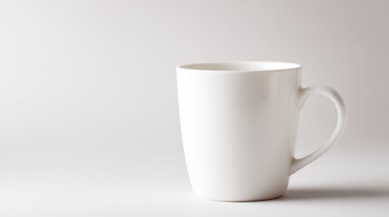 Fototapeta premium Empty white coffee mug, studio shot