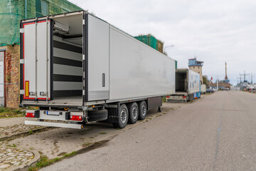 Open Cargo Trailer Parked in Industrial Port