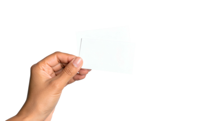 Hand holding two blank cards against black backdrop, with visible skin and card edges