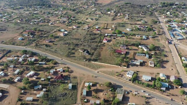 aerial view Serowe hills Botswana, village houses residential, with dirt roads, daytime, rural area
