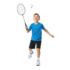 Energetic young boy in blue shirt plays badminton with a racket and shuttlecock