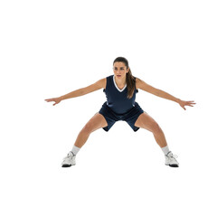 Fototapeta premium Athletic young woman in basketball uniform in defensive stance against a black background