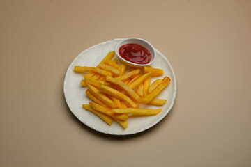 Indulge in a plate of delicious, crispy French fries served