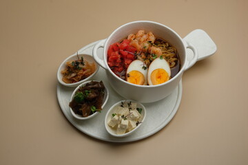 Experience a Delicious AsianInspired Noodle Bowl accompanied by flavorful Sides