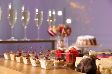 Buffet menu. Delicious desserts and drinks on table, selective focus