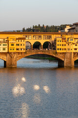 Ponte Vecchio stradling the Arno River, Florence, Tuscany, Italy