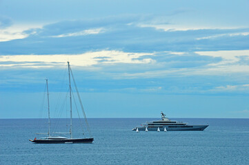 Four small sailboats