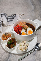 A Delicious and Hearty Meal Featuring Eggs and Accompanying Sides