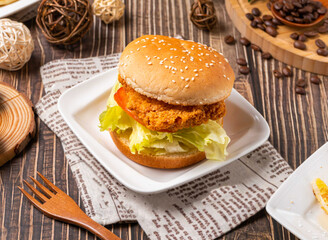 Savor the flavor of this tempting chicken burger. Perfect for food blogs, restaurant menus, or social media promotions. Delicious, satisfying, and visually appealing.