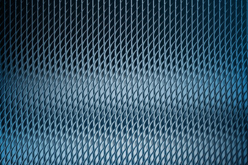 Closeup abstract view of a metallic mesh with a blue hue, showcasing its intricate diamond pattern and reflective surface