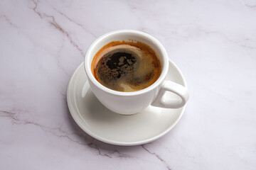 An Aromatic Espresso Served in a White Cup Beautifully Placed