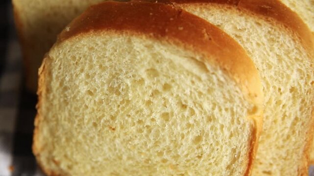 Brioche bread slices bakery pastry natural product tasty snack fresh delicious gourmet food background on the table rustic top view copy space