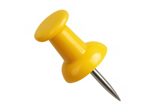 Yellow pushpin pointing downwards, a common office supply for pinning important notes and documents
