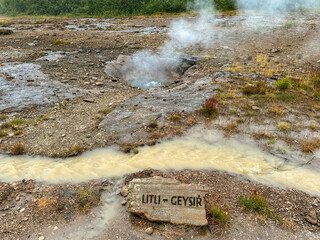 Strokkur, Iceland - 31 August 2024: Sign in front of the Little Geysir in the Geysir Hot Spring Area
