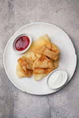 Indulge in Delicious Pancakes served with a Variety of Tasty