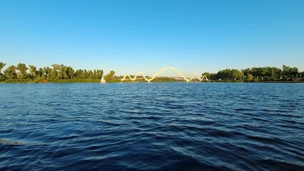 Dnieper River in Kyiv city, near Wave Bridge and Obolonsky Island. Video footage from floating yacht