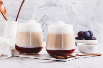Homemade berry latte in glasses on the table