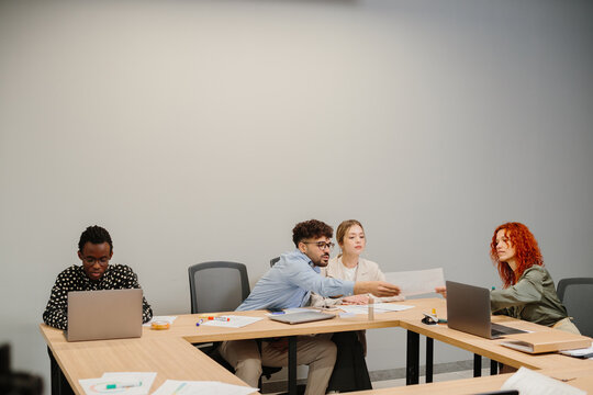 Diverse business team collaborating during a meeting - Powered by Adobe