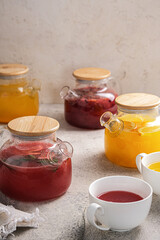 Vibrant Herbal Teas Displayed in Elegant Glass Jars with Beautiful