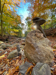 Sunburst Through Stacked Rocks