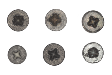 Used screw and bolt heads with signs of wear, scratches, dents, rust spots. Close-up view. Isolated on transparent background. Set 6.