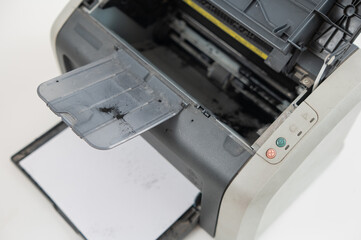 Broken laser printer cartridge on white background. 